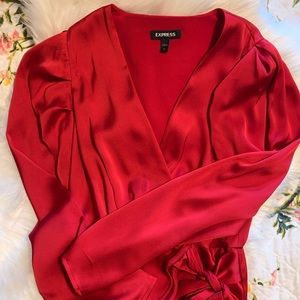 Red silky long sleeve wrap top.